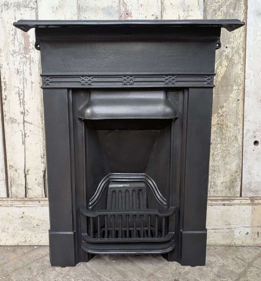 FC0245 A RECLAIMED EDWARDIAN CAST IRON BEDROOM COMBINATION FIRE