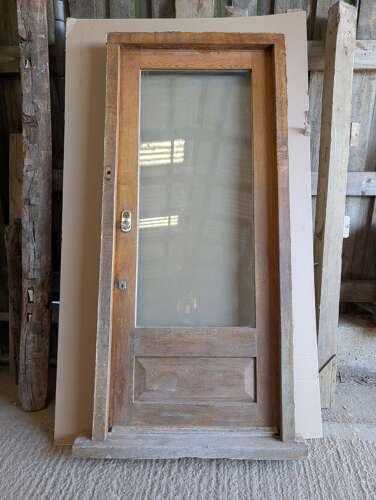DE1036 A RECLAIMED OAK EXTERNAL / FRONT DOOR IN FRAME WITH DOUBLE GLAZED PANEL