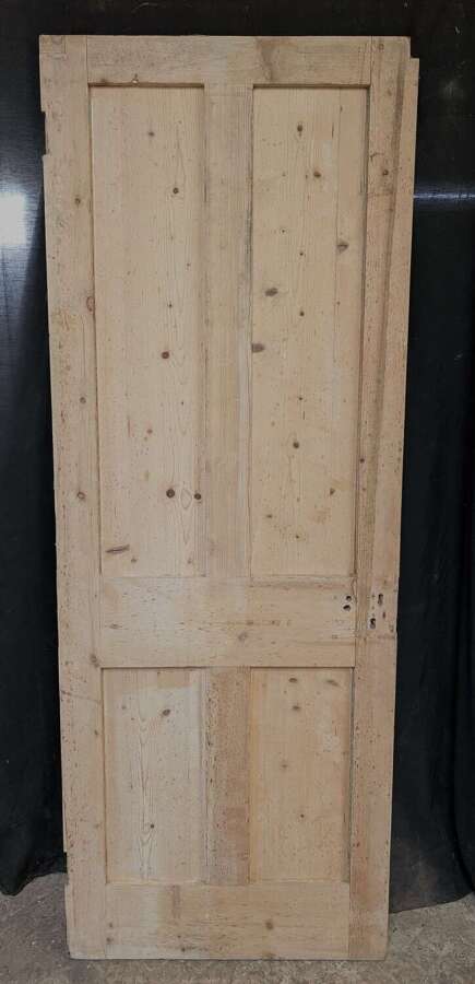 DI1027 A RECLAIMED STRIPPED PINE FOUR PANEL INTERNAL DOOR