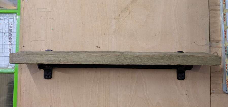 M2215 A RUSTIC PINE SHELF WITH IRON BRACKET MADE FROM RECLAIMED MATERIALS
