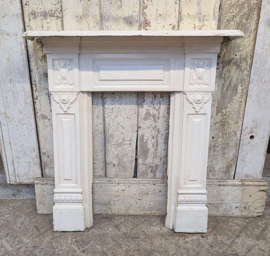 FS0452 A PETITE RECLAIMED PAINTED CAST IRON FIRE SURROUND / WOOD BURNER