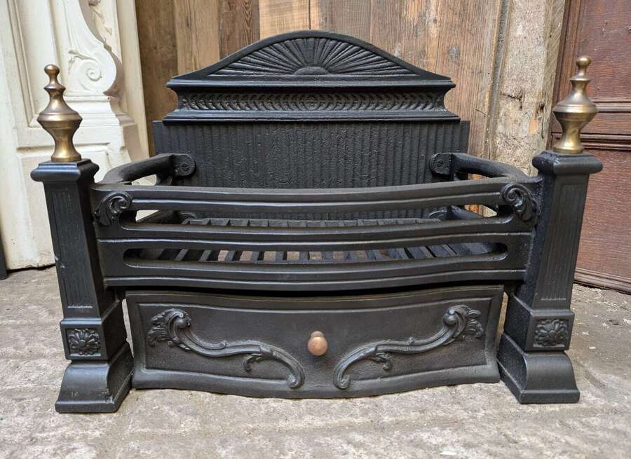 FB0196 A RECLAIMED ORNATE VINTAGE CAST IRON AND BRASS FIRE BASKET