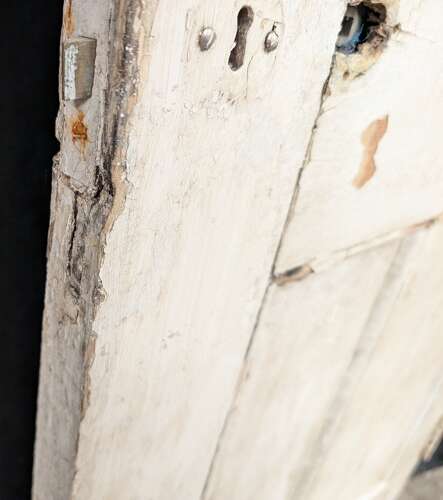 DI1058 A RECLAIMED PAINTED PINE FOUR PANEL INTERNAL DOOR