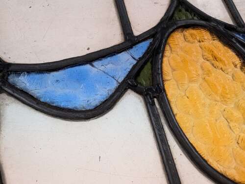 M2311 A SET OF FOUR RECLAIMED STAINED GLASS PANELS C.1920s