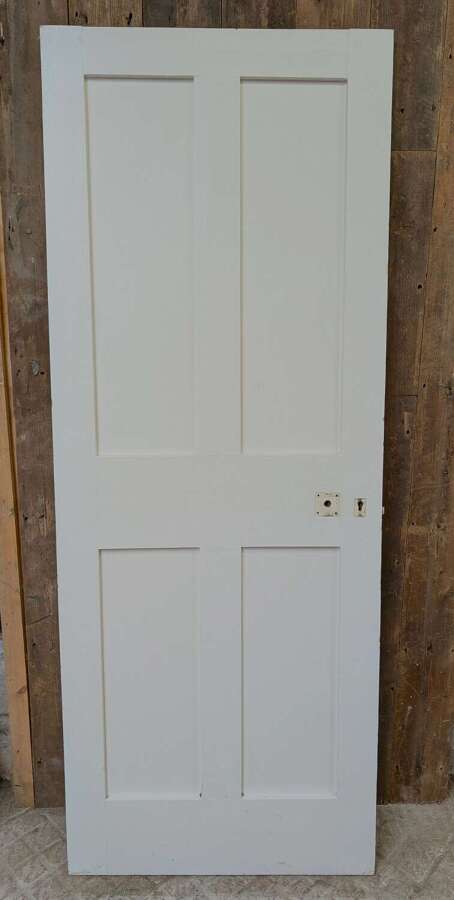 DI1103 A RECLAIMED PAINTED PINE FOUR PANEL INTERNAL DOOR
