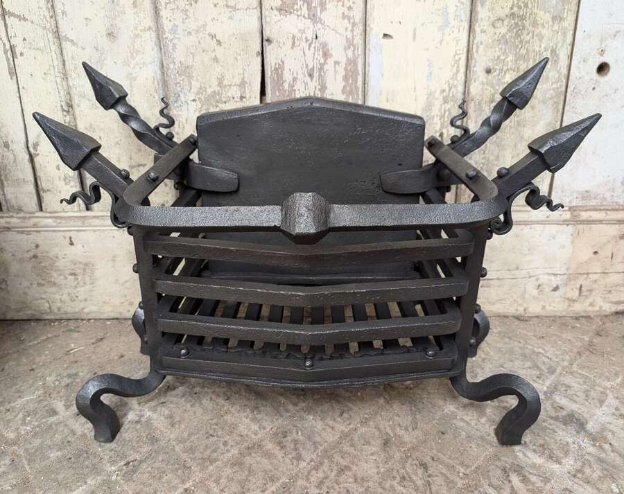 FB0214 A VERY STRIKING GOTHIC STYLE IRON FIRE BASKET WITH BACK