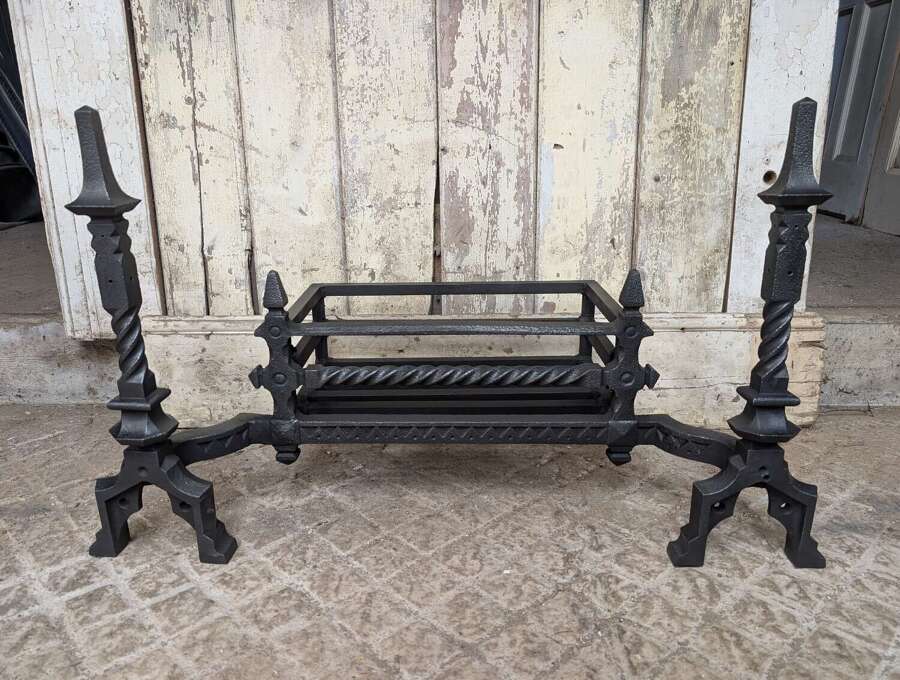 FB0215 A DECORATIVE RECLAIMED CAST IRON FIRE BASKET WITH INTEGRATED FIRE DOGS