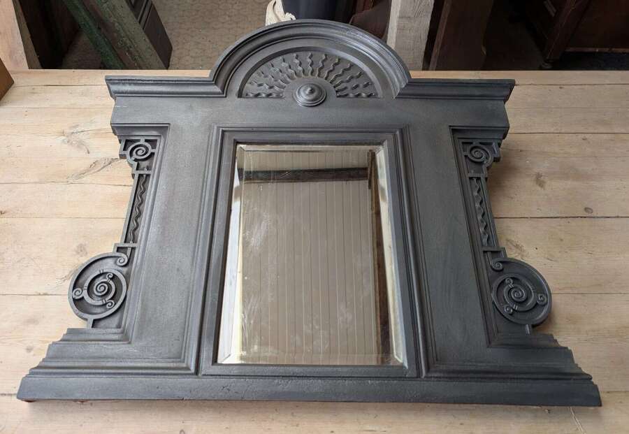 M2356 A RECLAIMED ANTIQUE CAST IRON OVERMANTEL MIRROR WITH BEVELLED GLASS