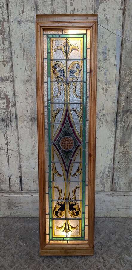 M2370 A RECLAIMED STAINED GLASS PANEL ATTACHED TO A LIGHTBOX