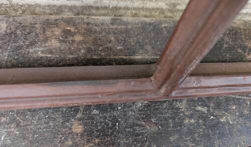 M2374 AN ATTRACTIVE RECLAIMED ARCHED CAST IRON WINDOW GLASS INCLUDED -NOT FITTED