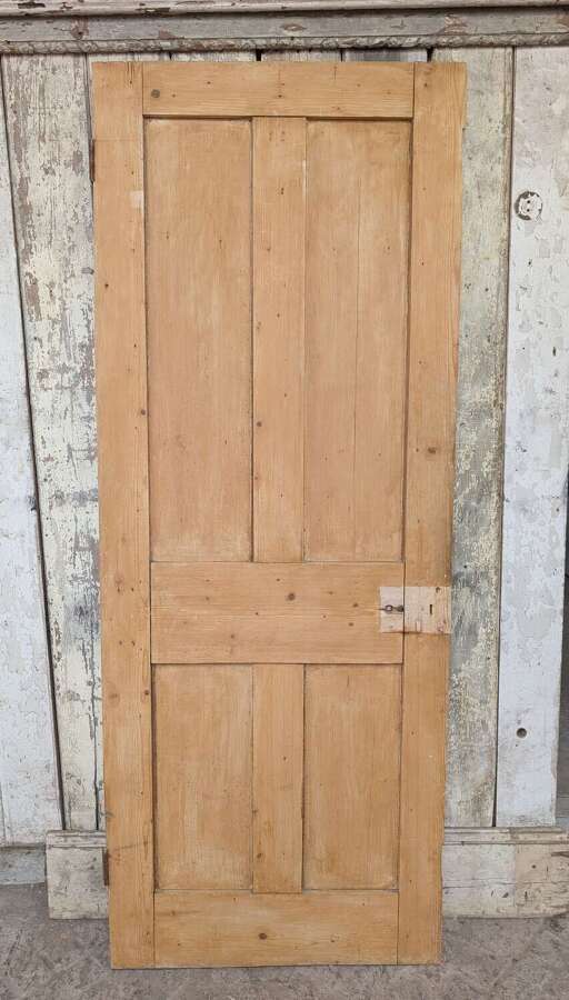 DI1121 A RECLAIMED STRIPPED PINE FOUR PANEL INTERNAL DOOR