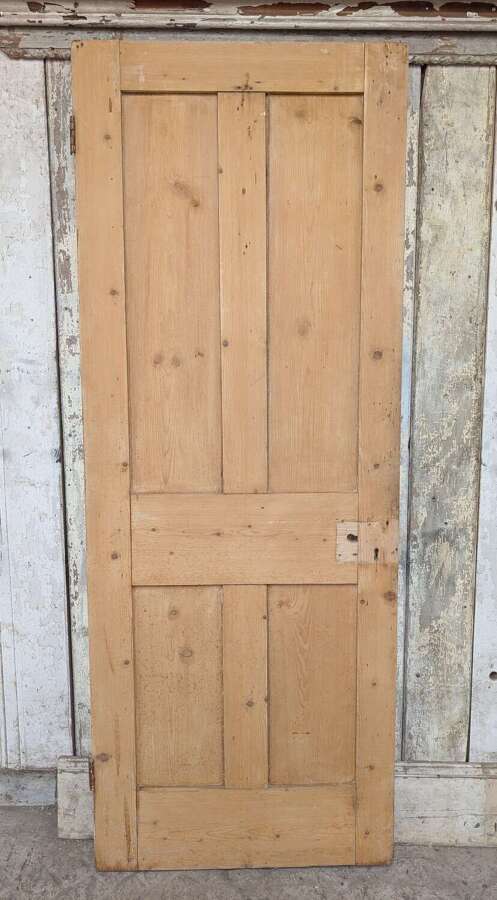 DI1122 A RECLAIMED STRIPPED PINE FOUR PANEL INTERNAL DOOR